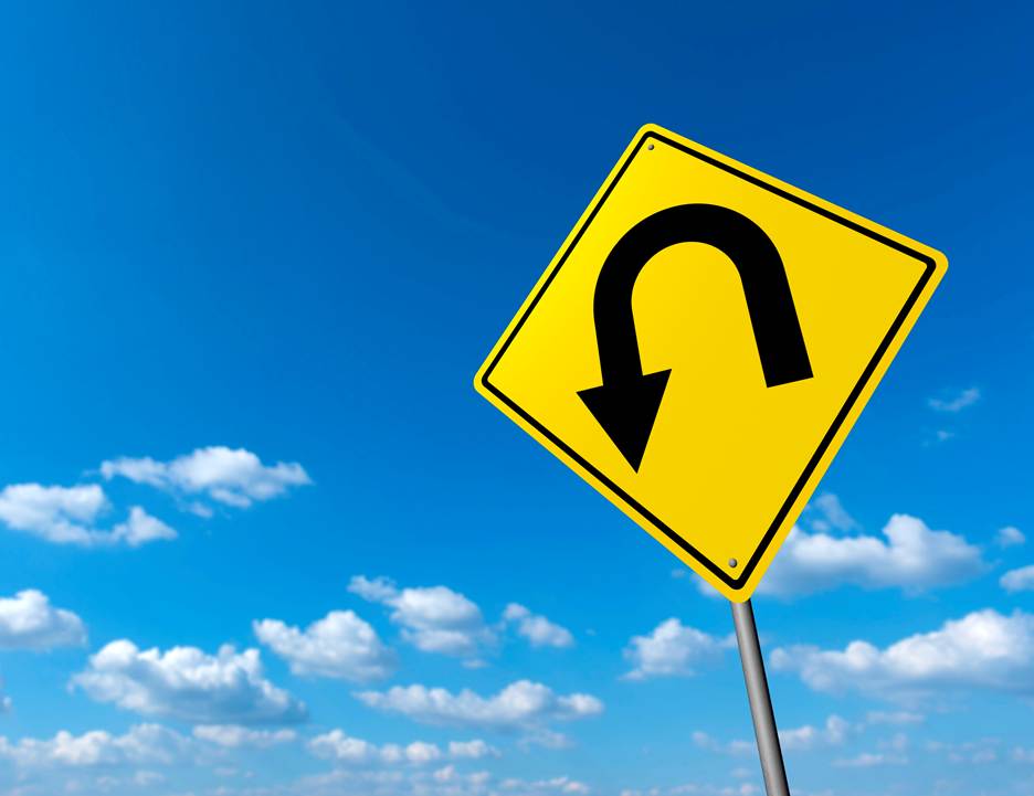 A yellow road sign with a black arrow

AI-generated content may be incorrect.